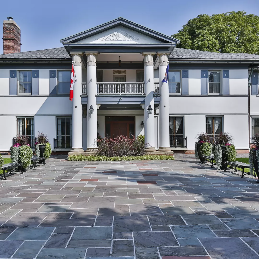 View of the stone courtyard in front of the Heintzman House.