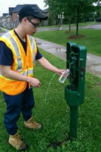 water quality test worker performing a test