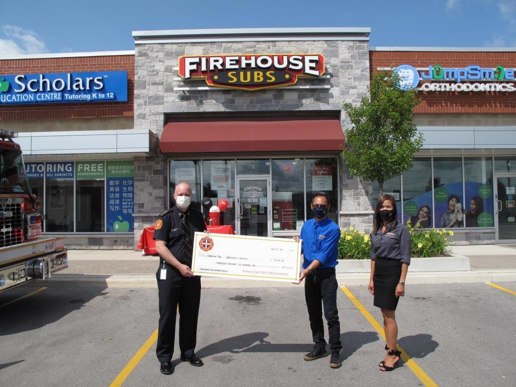 Chief Adam Grant receiving the Firehouse Subs Public Safety Foundation of Canada grant