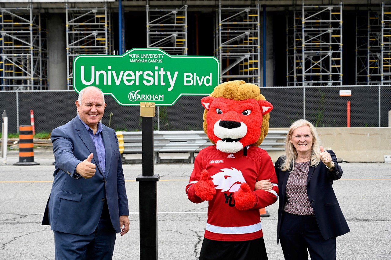 Markham Mayor Frank Scarpitti, York University mascot Yeo the Lion and York University President and Vice-Chancellor Rhonda Lenton.