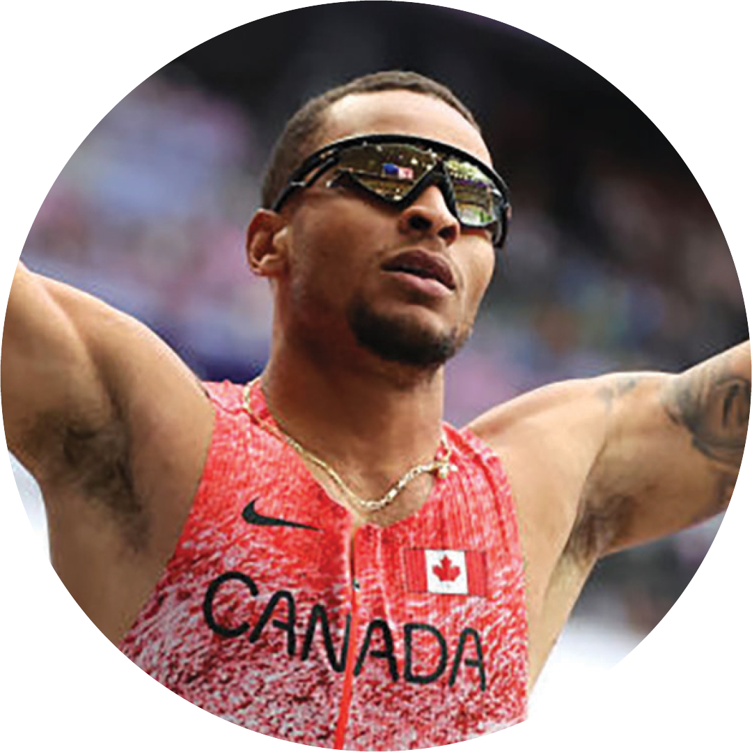 Andre De Grasse celebrating.